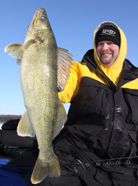 image of Jon Thelen holding giant Walleye